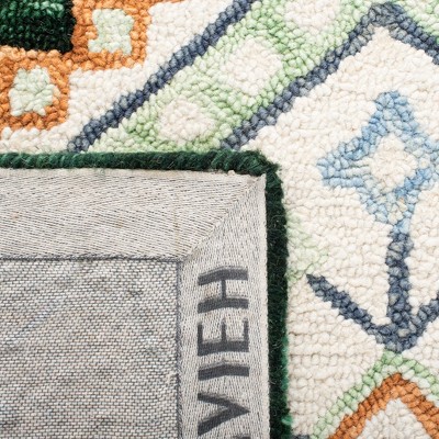 Ivory and Green Hand Tufted Wool Area Rug 8' x 10'