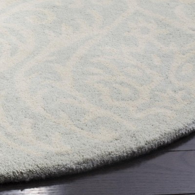 Ivory and Silver Round Hand-Tufted Wool Area Rug