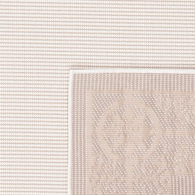 Ivory and Beige Geometric Synthetic Indoor/Outdoor Area Rug