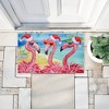 Stupell Industries Holiday Flamingo Girlfriends Printed Outdoor Door Mat, design by Paul Brent, 18"x30" - 4 of 4
