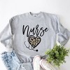 Simply Sage Market Women's Graphic Sweatshirt Leopard Nurse Heart - 3 of 3