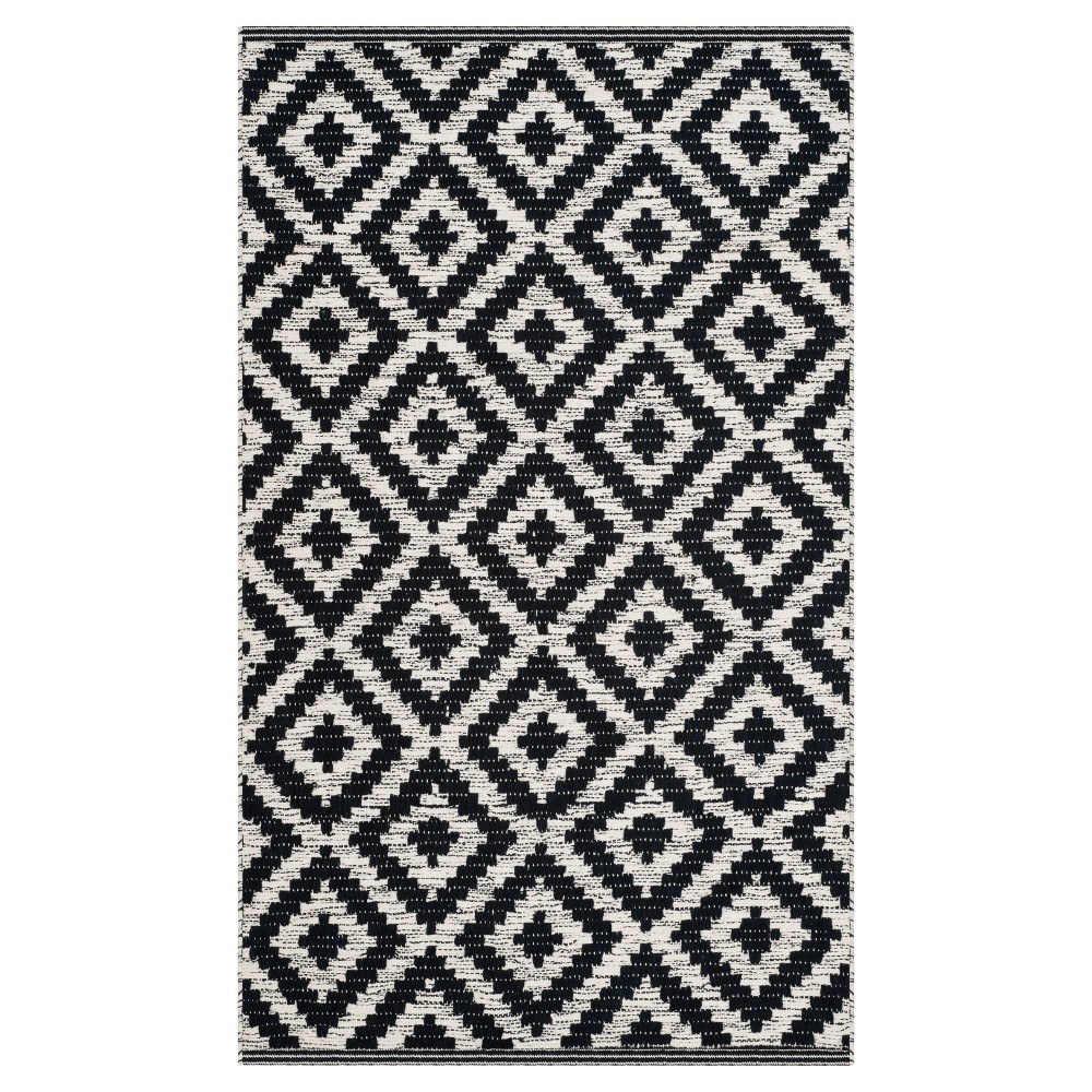 8'x10' Jaida Woven Rug Black/Ivory - Safavieh