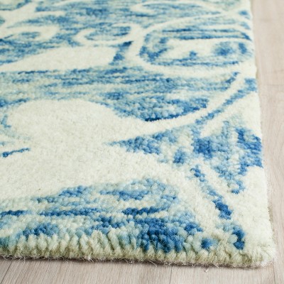 Off-White and Blue Hand-Tufted Wool 8' x 10' Area Rug