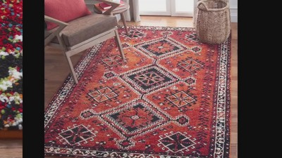 Vintage Red and Black Synthetic 5' x 7' Area Rug