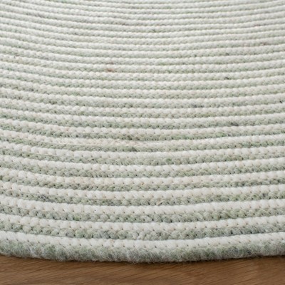 Handmade Ivory and Green Braided Wool Round Rug, 4' x 4'
