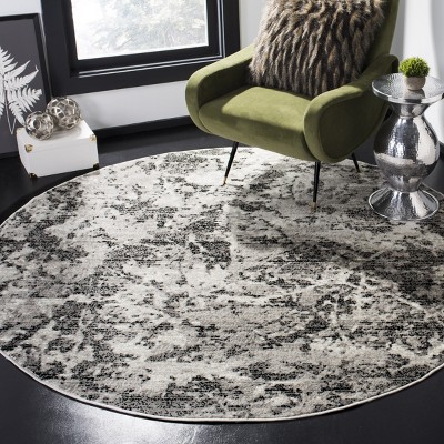 Charcoal and Ivory Round Medallion Synthetic Area Rug