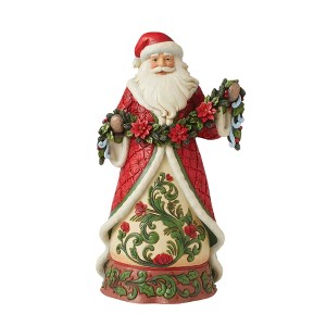 Jim Shore 12.0 Inch Seasonal Swag Santa With Poinsettia Garland Santa Figurines - 1 of 3