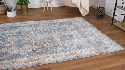 Light Blue Abstract 5' x 7' Stain-Resistant Area Rug