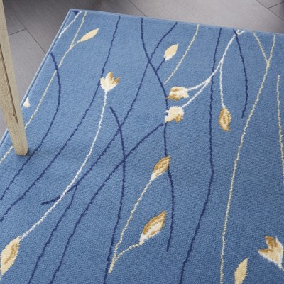 Light Blue Floral Synthetic 5' x 7' Area Rug