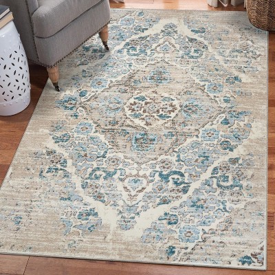 Cream and Blue 9' x 12' Synthetic Oriental Area Rug