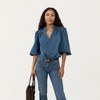 Anna-Kaci Women’s Denim Button Front Top with Puff Elbow Sleeves Structured Collar Detail Woven Fabric and Relaxed Silhouette - 2 of 4