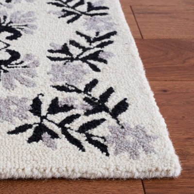 Empire Black and Ivory Hand-Tufted Wool Area Rug