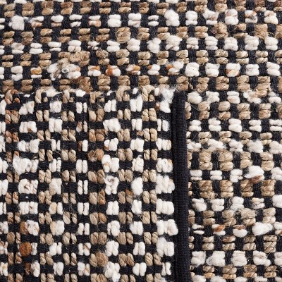 Handmade Black and Ivory Wool Flat Woven Area Rug