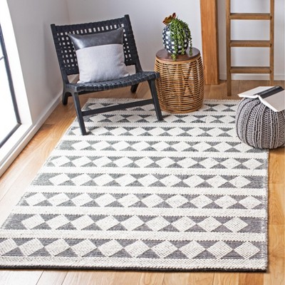 Handmade Black and Ivory Geometric Wool Area Rug