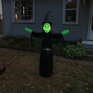 Sunnydaze Outdoor Wendolyn the Wicked Witch Self-Inflating Halloween Inflatable Yard Decoration with LED Lights and Built-In Fan - 5' - 1 of 4