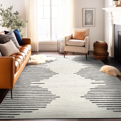 Cream and Black Geometric Stripe Synthetic Area Rug 7'10" x 10'