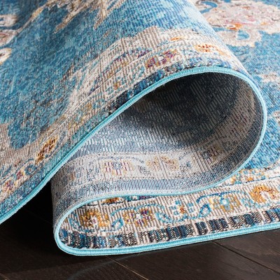 Navy and Ivory 4' x 6' Synthetic Oriental Area Rug