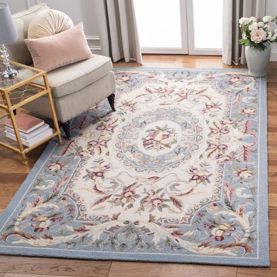 Blue Floral Hand-Hooked Wool Area Rug 5'3" x 8'3"