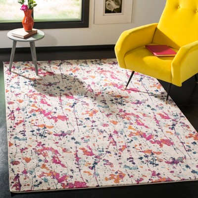 Ivory and Red Speckled Print Synthetic Area Rug