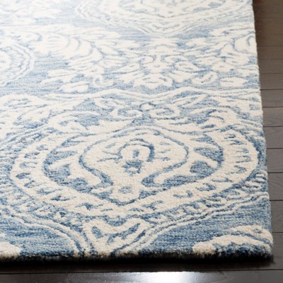 Blue and Ivory Hand-Tufted Wool 4' x 6' Area Rug