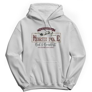 Rerun Island Men's Christmas North Pole Long Sleeve Graphic Cotton Hoodie - 1 of 1