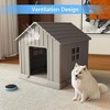CAVINAS  Weatherproof Outdoor Dog House, 38" Ventilated Pet Shelter with Elevated Floor & Ground Anchors,Light Brown - 2 of 4