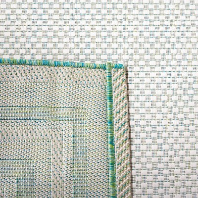 Ivory and Green Reversible Synthetic Indoor/Outdoor Area Rug