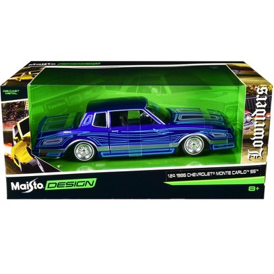 1986 Chevrolet Monte Carlo SS Lowrider Candy Blue with Graphics "Lowriders" Series 1/24 Diecast Model Car by Maisto