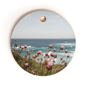 Henrike Schenk - Travel Photography Pink Flowers by the Ocean Cutting Board Round - Deny Designs - 1 of 3