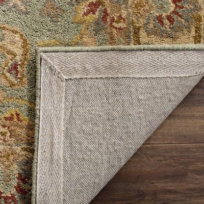 Ivory Elegance Handmade Wool 5'x8' Reversible Tufted Rug