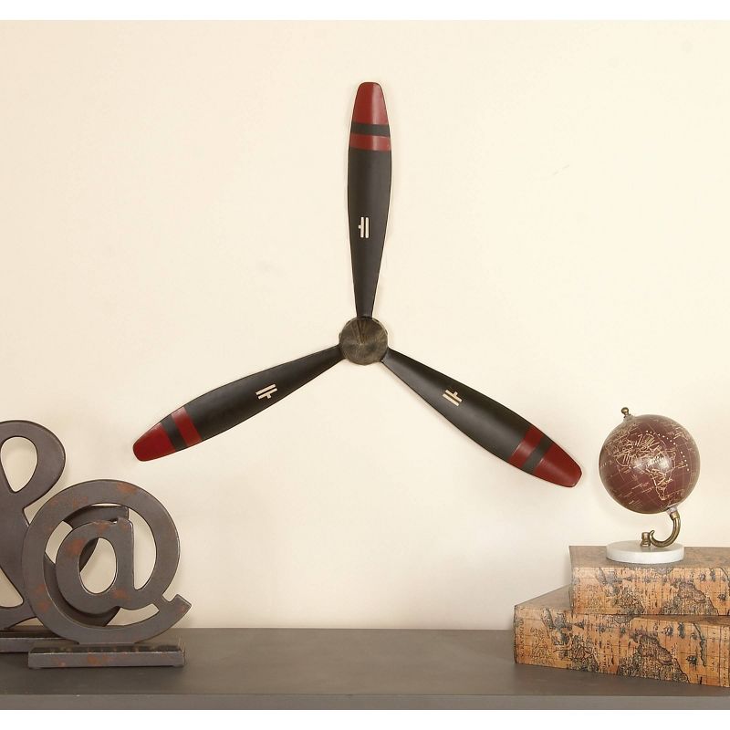 25&#34; x 22&#34; Metal Airplane Propeller 3 Blade Wall Decor with Aviation Detailing Black - Olivia &#38; May, 1 of 6