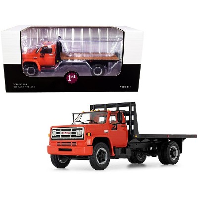 GMC 6500 Flatbed Truck Orange and Black 1/34 Diecast Model by First Gear