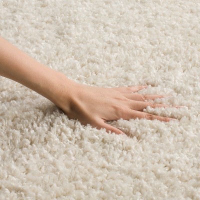 Cream 8' x 10' Tufted Shag Area Rug