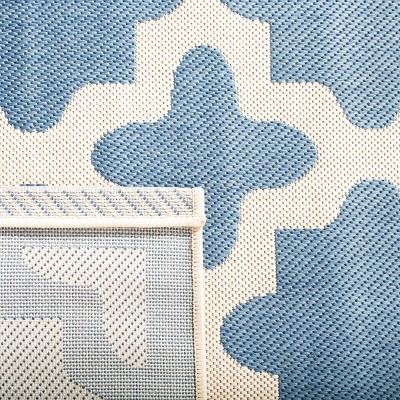 Blue and Beige Synthetic 79" Rectangular Indoor/Outdoor Rug