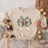 Simply Sage Market Women's Graphic Sweatshirt Holly Leaves Coquette - 3 of 4