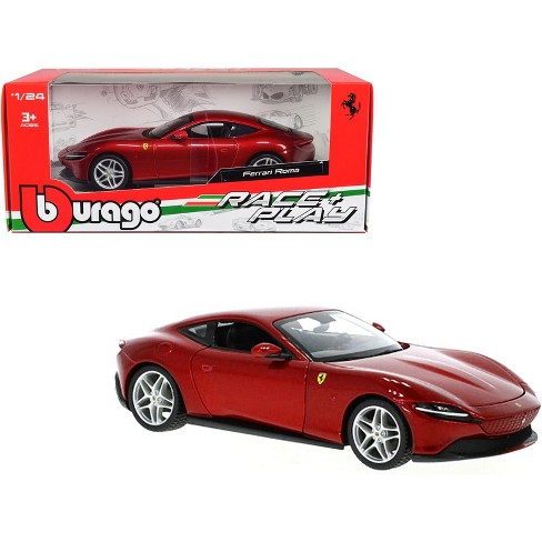 Burago red Ferrari car with baby toy remote +12 months