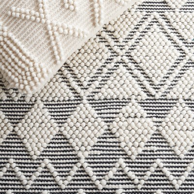 Black and Ivory Hand Tufted Wool 3' x 5' Area Rug