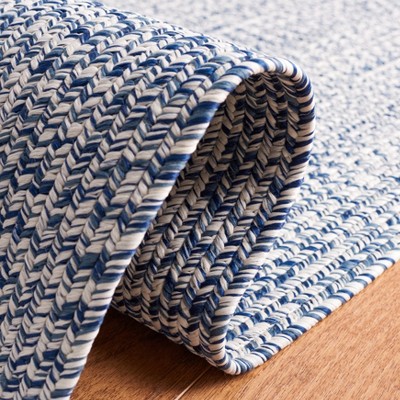 Handwoven Reversible Dark Blue and Ivory Synthetic Area Rug - 27"x6"