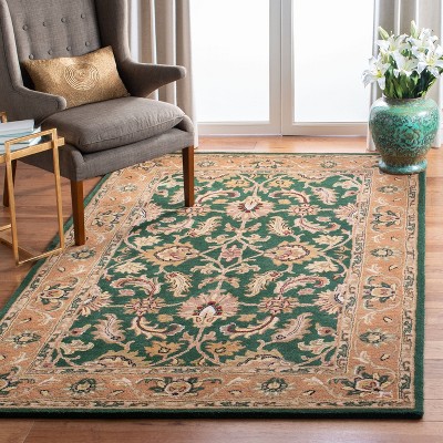 Handmade Dark Green and Gold Oval Wool Area Rug