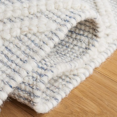 Ivory and Blue Hand-tufted Wool Cotton Blend 8' x 10' Area Rug