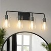 DORESshop 26 in. 4-Light Black Metal Vanity Light with Clear Glass Shade Bathroom Fixture for Modern Farmhouse Style Spaces - 3 of 4