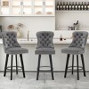 Modern Velvet Swivel Counter Height Bar Stools Set of 3,Upholstered Button Tufted Kitchen Island Footrest Barstools with Rivet Trim-Cuddlewood - 2 of 4