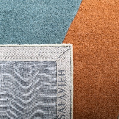 Hand-Tufted Blue Wool Rectangular Area Rug - 7'6" x 9'6"