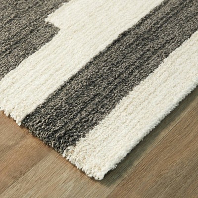 Brynja Off-White and Black Geometric Synthetic Area Rug