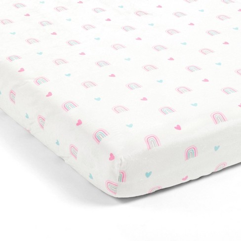 Rainbow polka dot store crib sheet