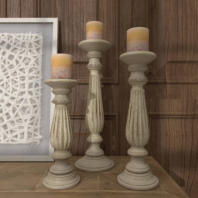 Elegant Mango Wood Teardrop Pillar Candlestick Trio, 18" Brown