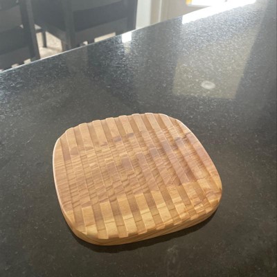 Starred Trivet in Olive Wood