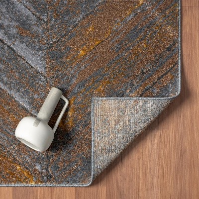 Gray and Bronze Chevron 5' x 7' Synthetic Area Rug