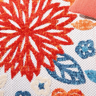 Cream and Red Floral 2' x 4' Synthetic Indoor/Outdoor Rug