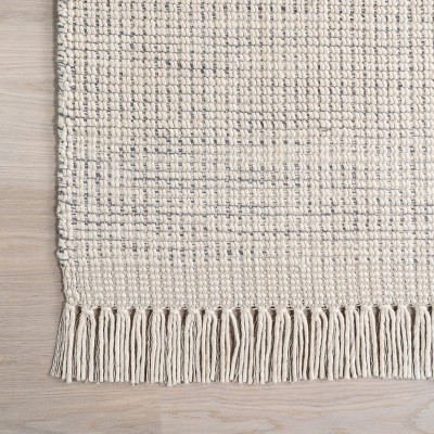 Handmade Ivory Wool Rectangular Area Rug with Fringe